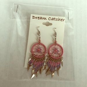 Handcrafted dangle earrings with beading
